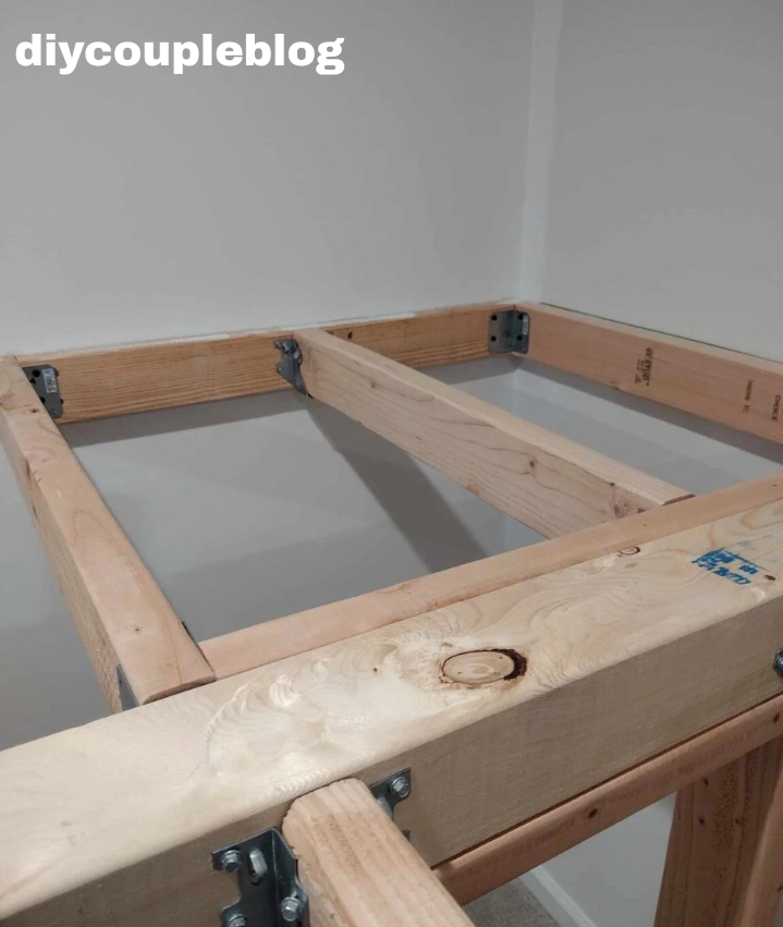 adding a "floor joist" across the center of the playground platform leading to the rock wall