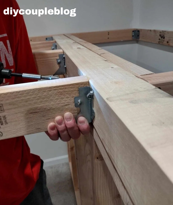 continuing fastening boards with 2x4 hangers 