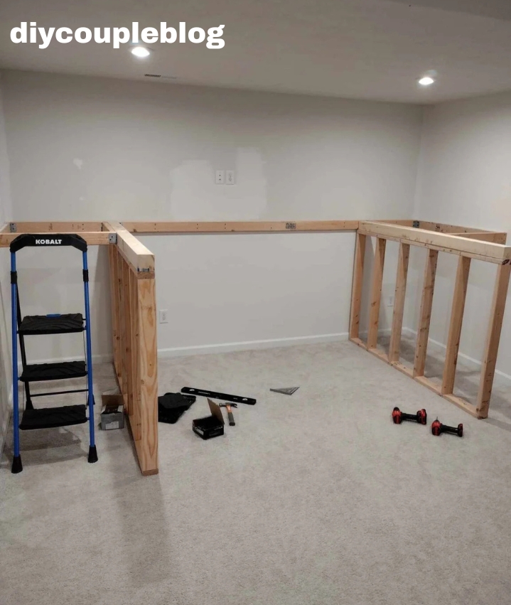 playground construction with support walls and anchored to the wall