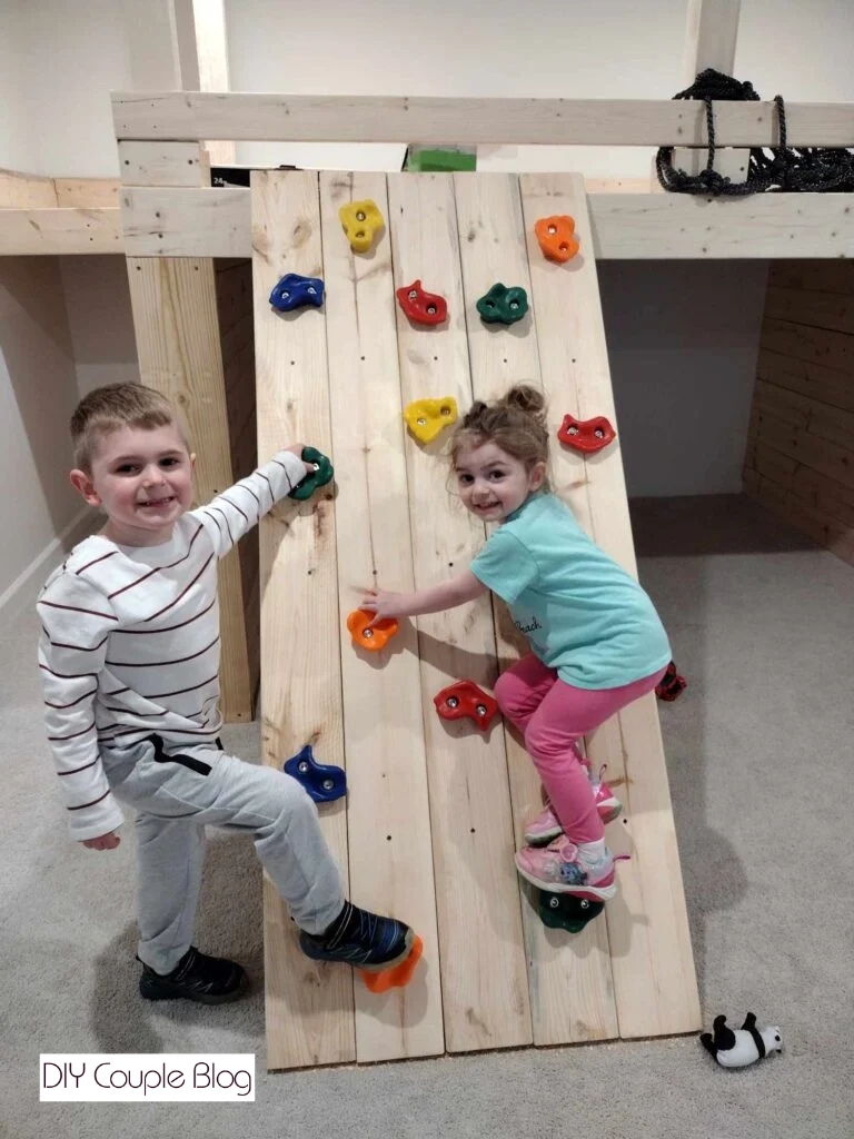 kids posing with Rock Climbing Wall 