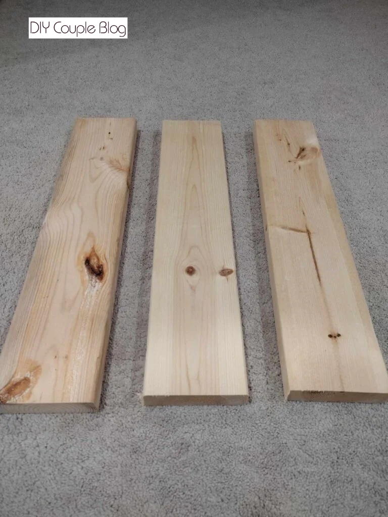 wood laying out on carpet 