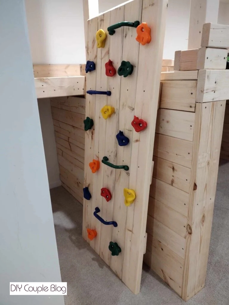 the process of building and installing a kids rock climbing wall in our basement 