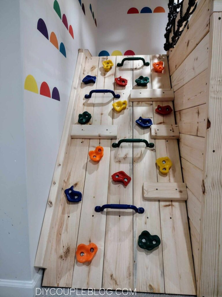 indoor playground at home with a rock wall