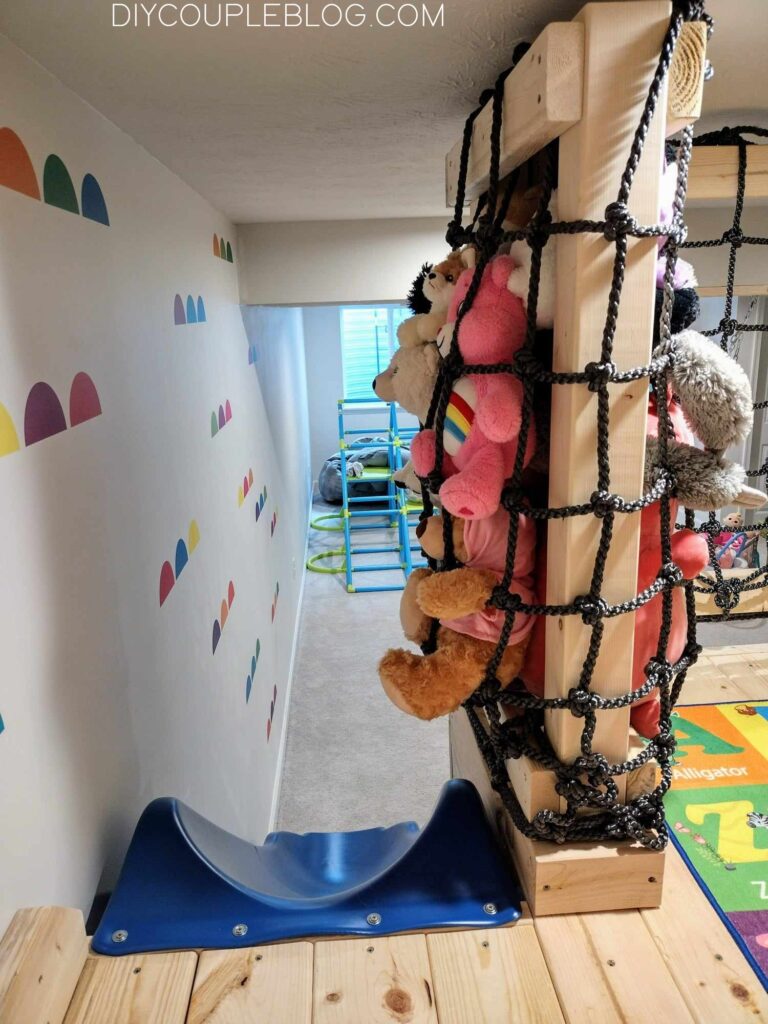 indoor playground at home with stuffed animal storage