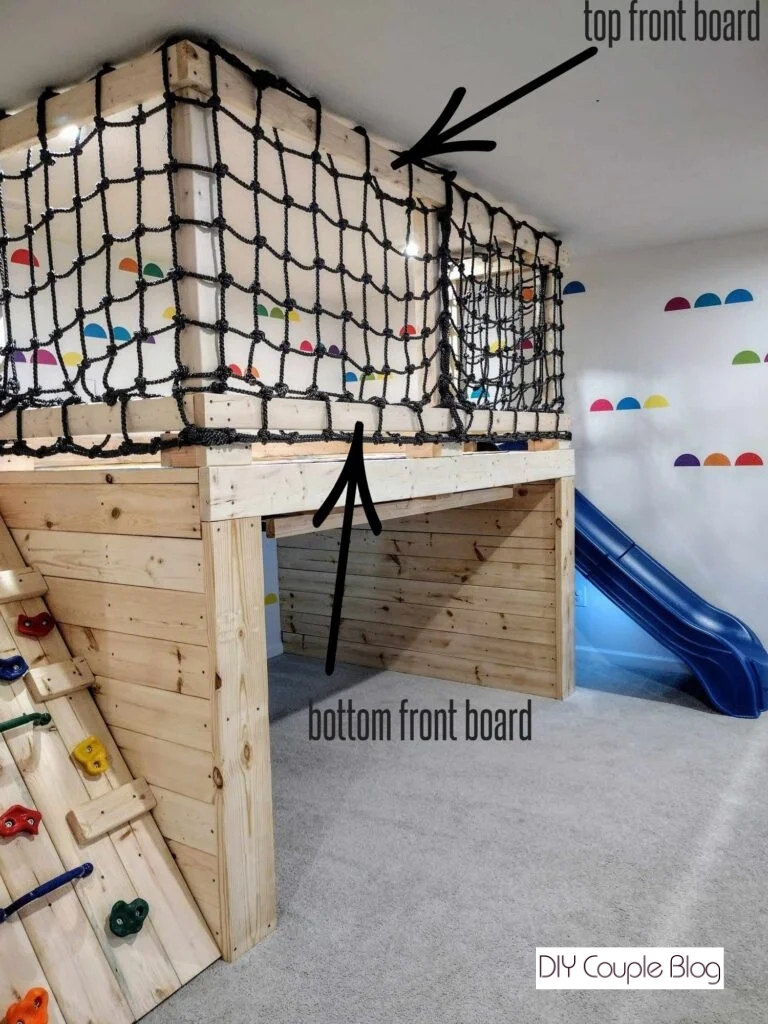 wood going through climbing net for playground