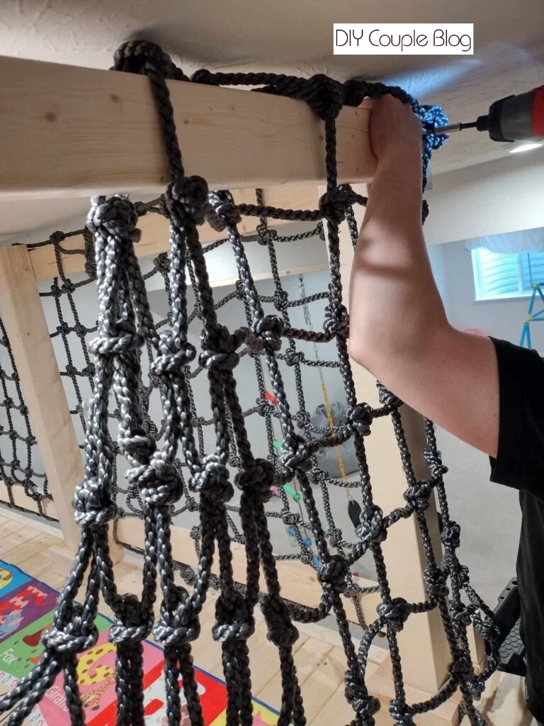 securing wood on the top section with drill 