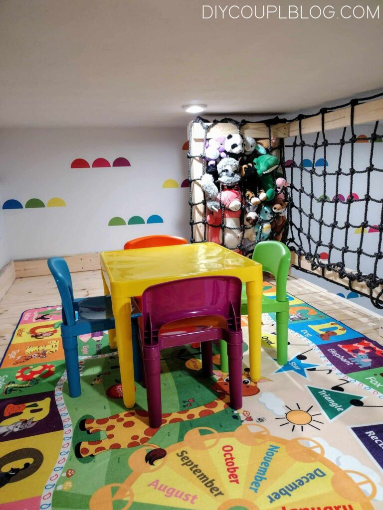 playroom rug with bright rainbow colors