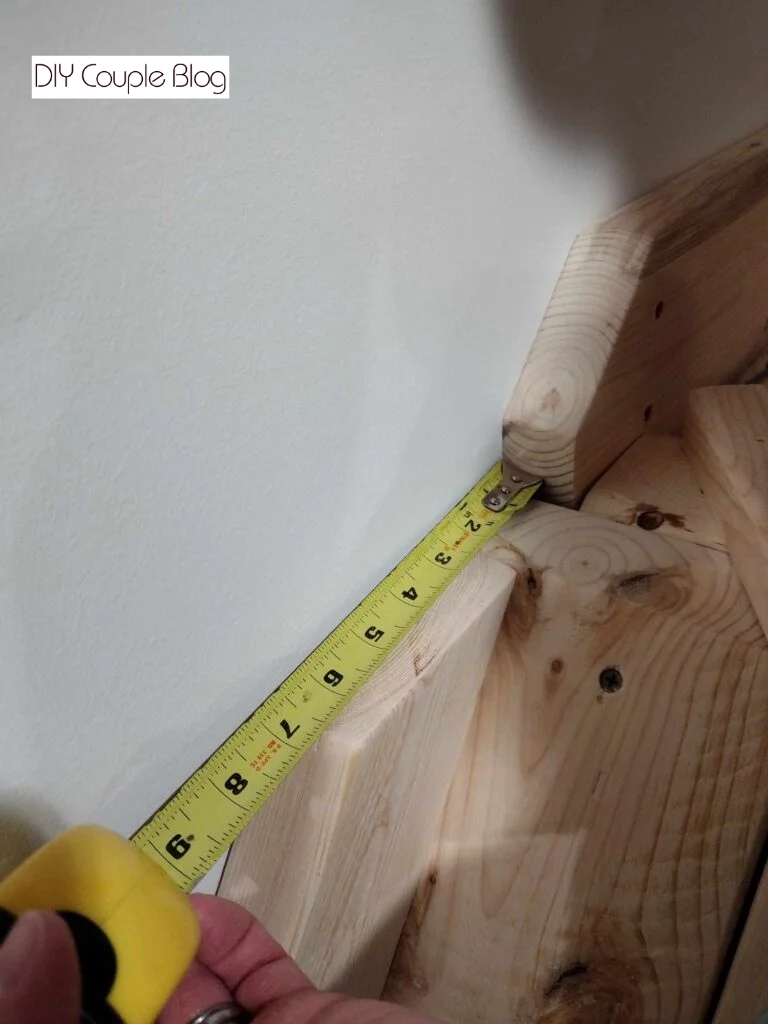 measuring on top of the cut board over 