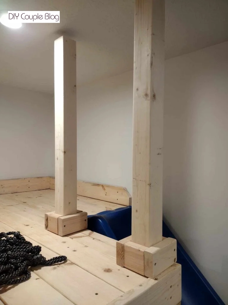 wood installed around the base of posts 