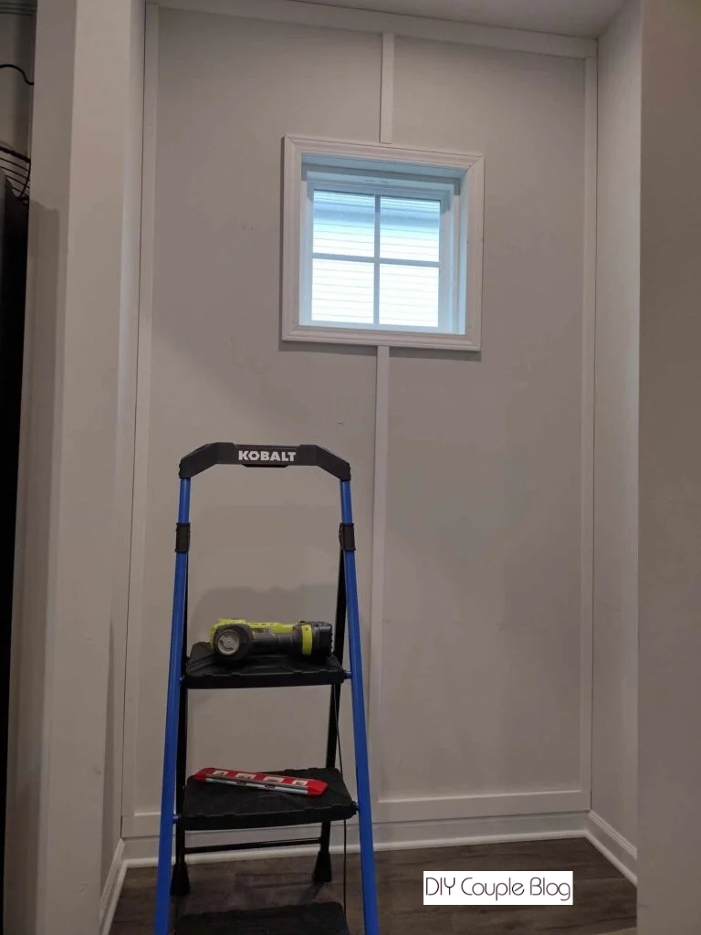 Installing vertical battens above and beneath the window frame