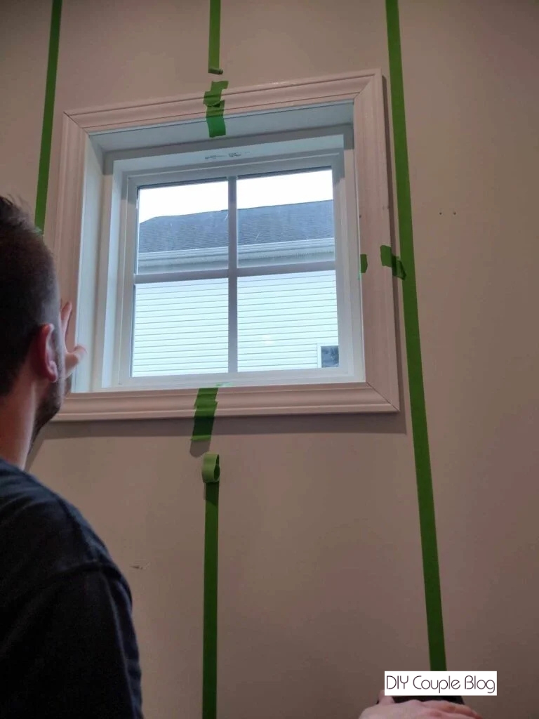 framing window before adding a board and batten project to the wall