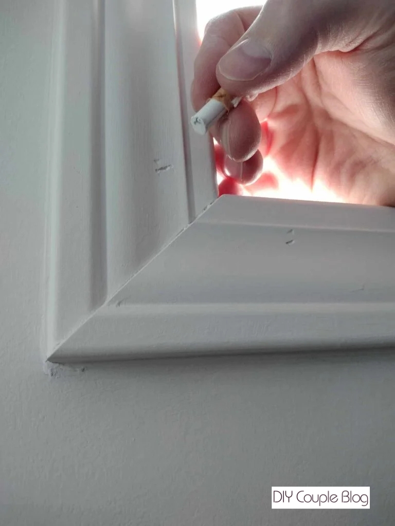 filling nail holes left behind on window trim installation