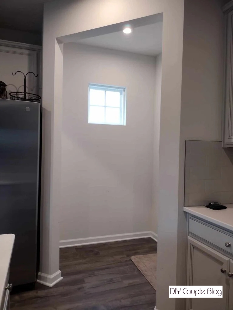 before photo of entryway nook with window