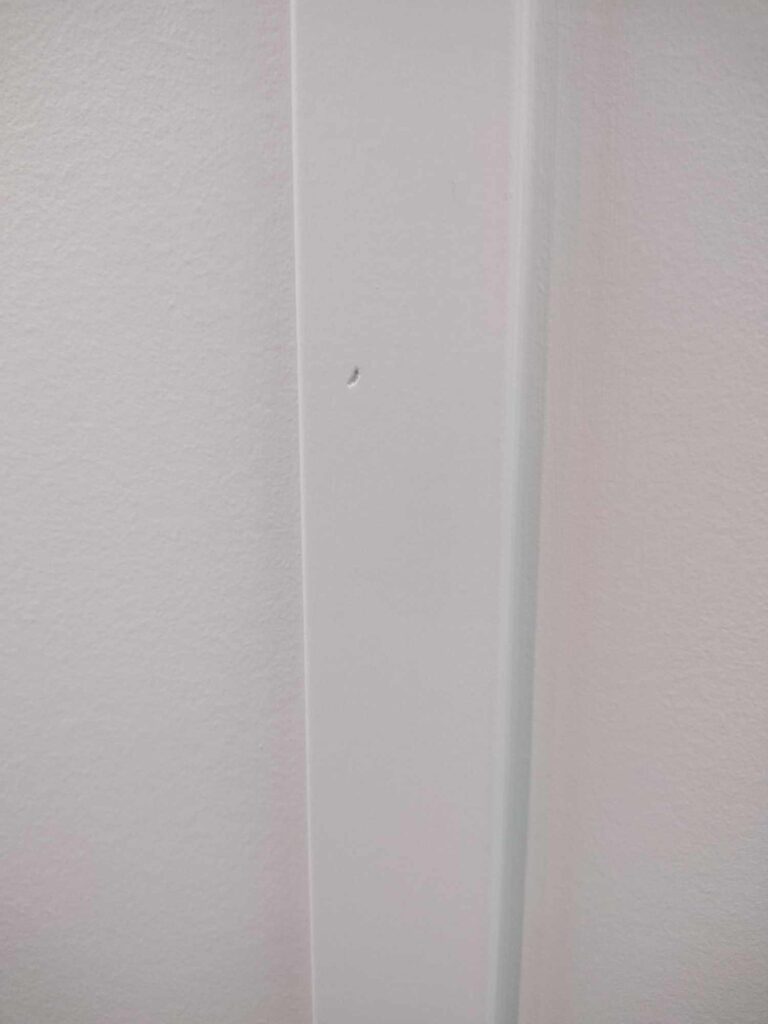 how to fill nail holes easily- before photo