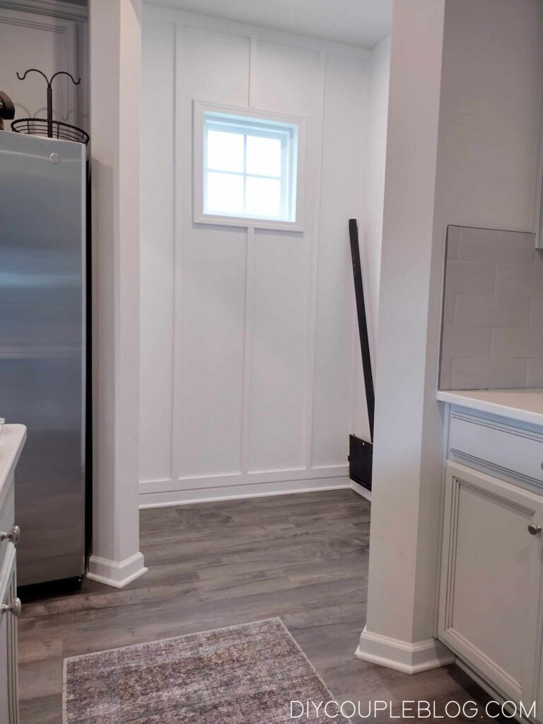 modern board and batten accent wall in our mudroom