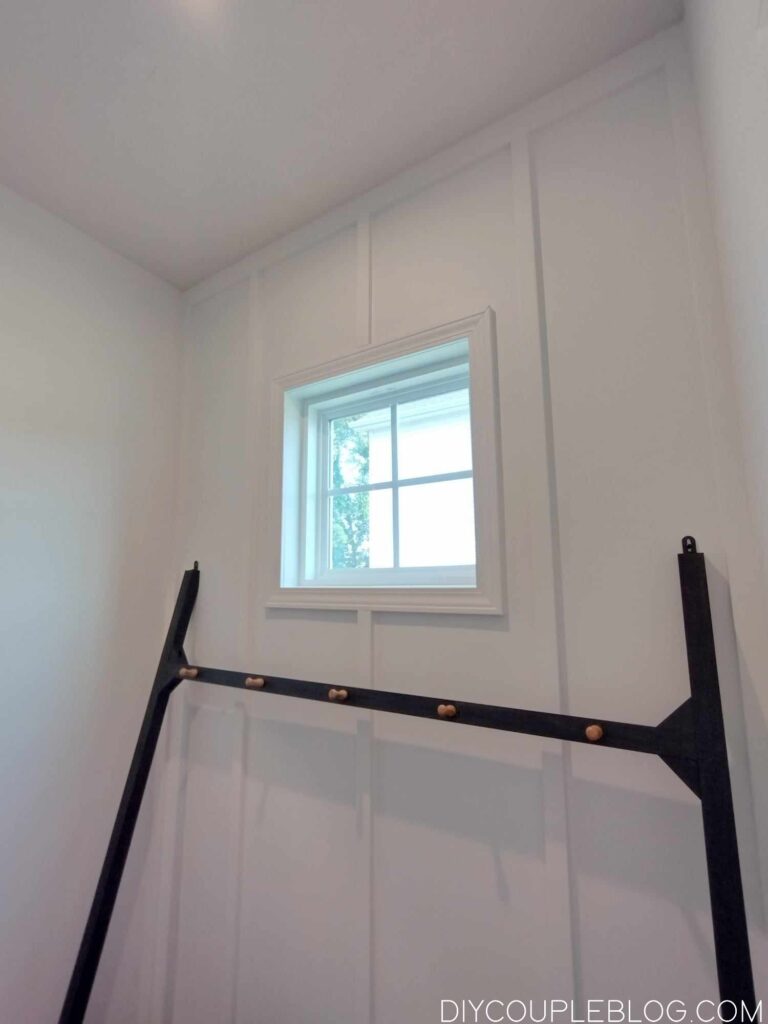 snowbound Sherwin Williams white board and batten wall in our mudroom