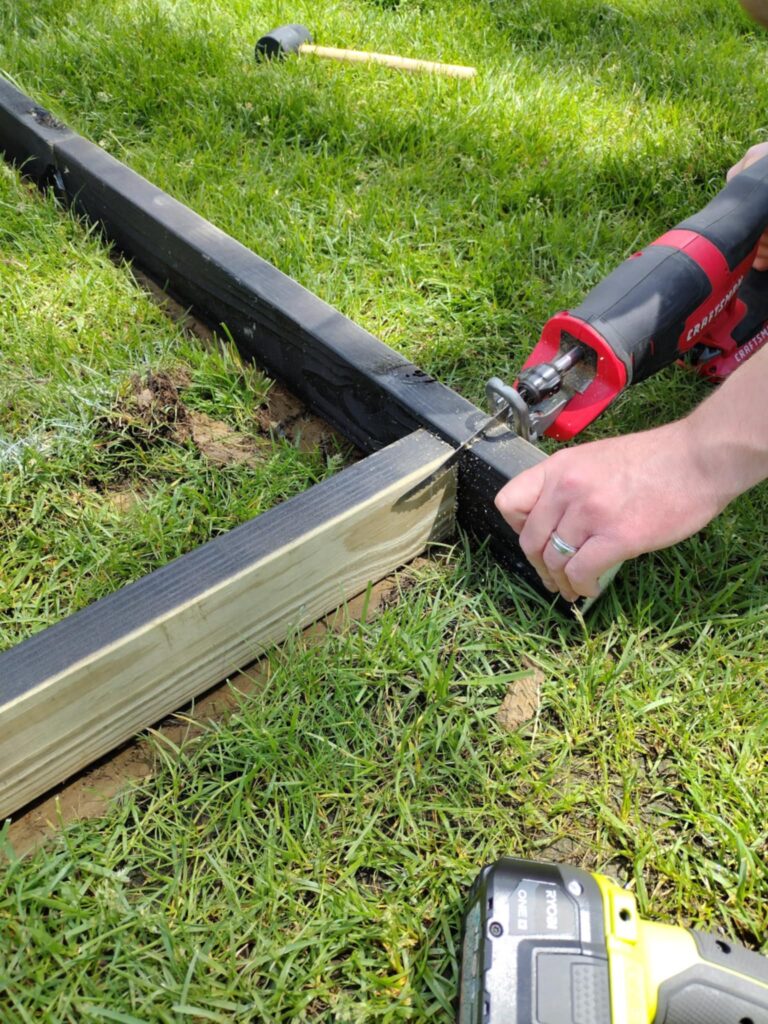 cutting the board to get rid of the overhang