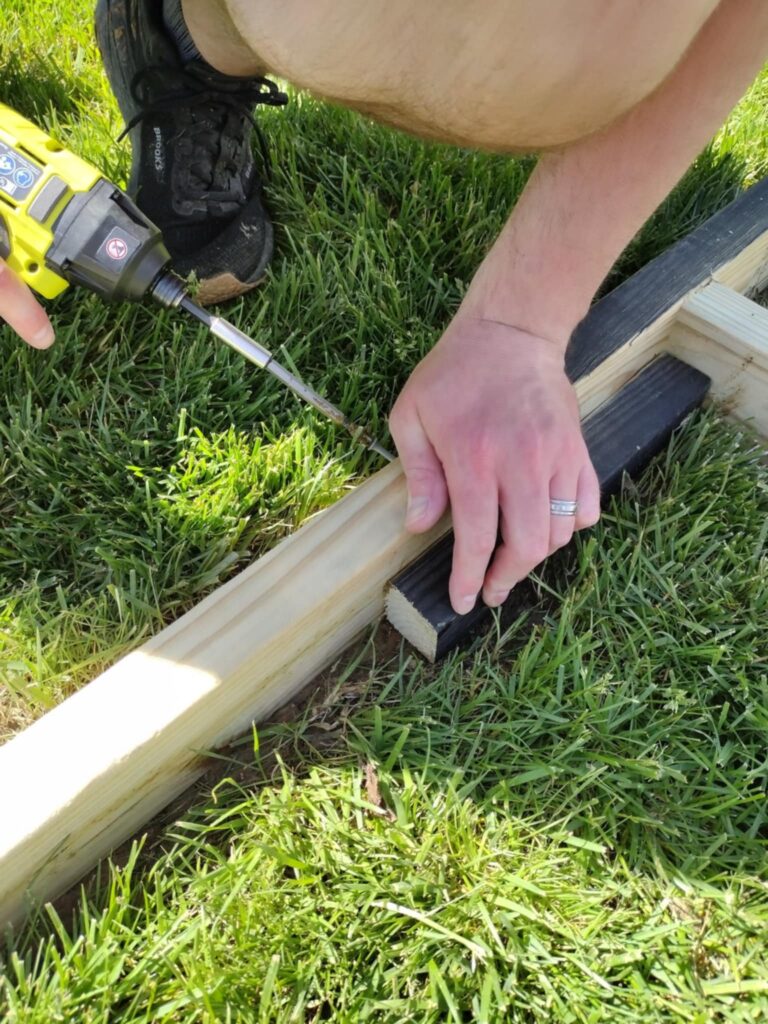 close up photo of attaching and securing boards together