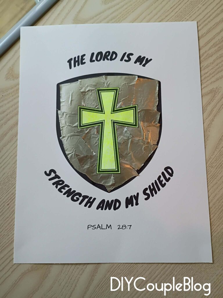 Shield of faith printable with torn aluminum foil and cross colored yellow