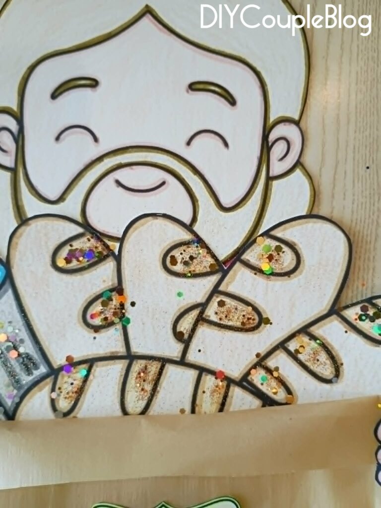 adding glitter to my loaves craft for a fun  Jesus feeds the 5000 miracle 