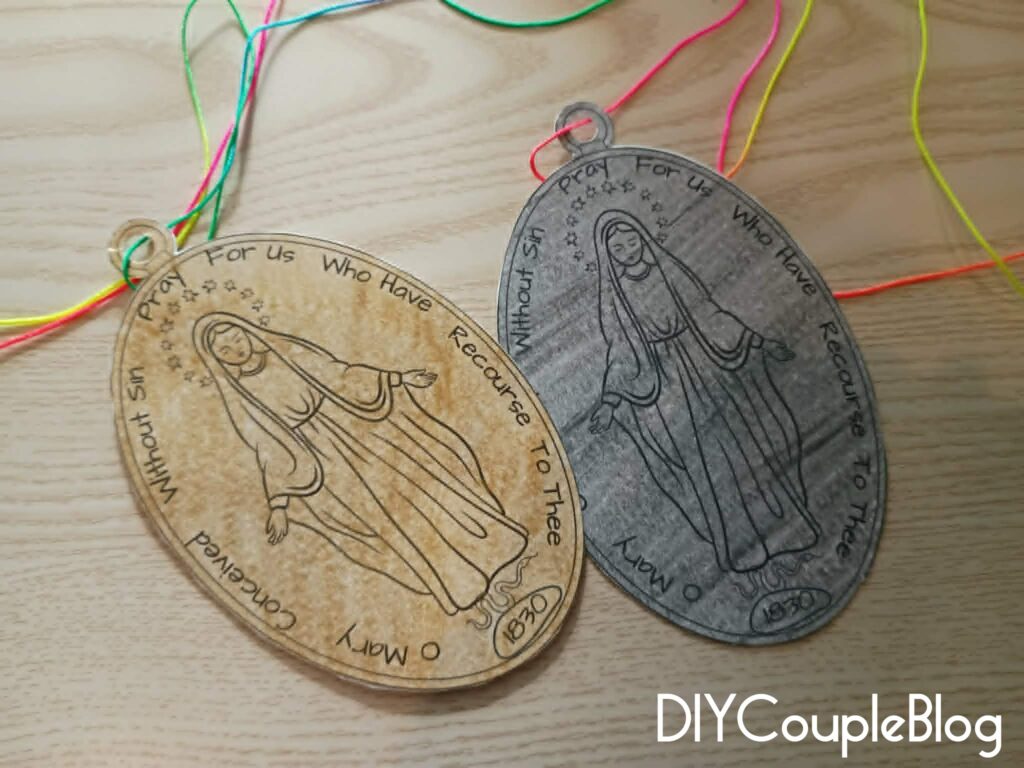 front side of our lady of the miraculous medal paper version craft necklace for kids