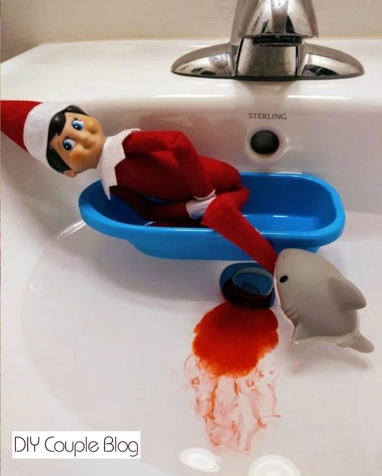 Elf got bitten by a shark sink idea with red food coloring 