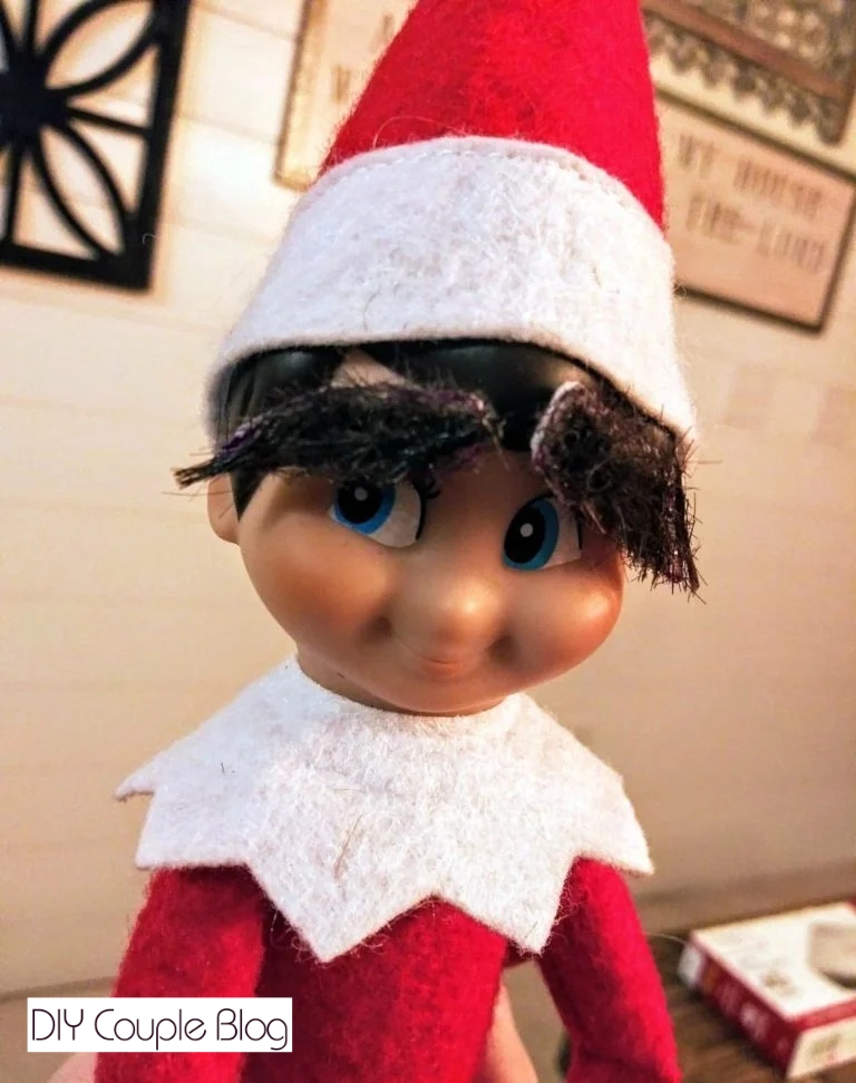 elf with hilarious fake eyebrows 