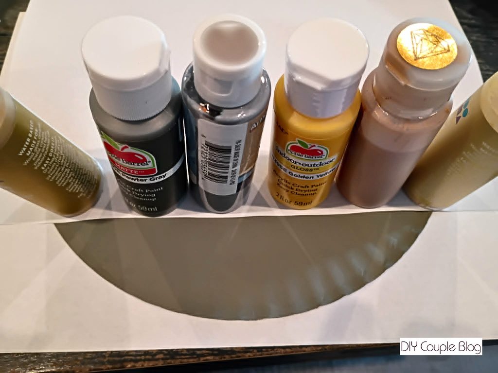 painting a paper plate gray for a whale and adding a white chin underbelly