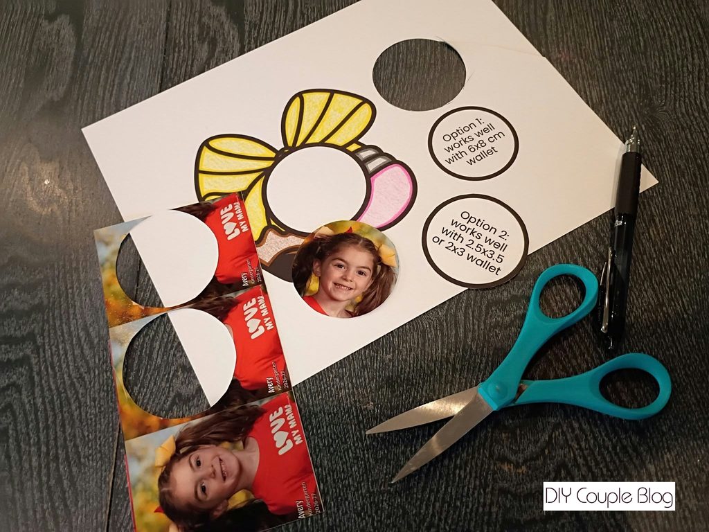 cutting the photo using the template provided from ornament print out sheet