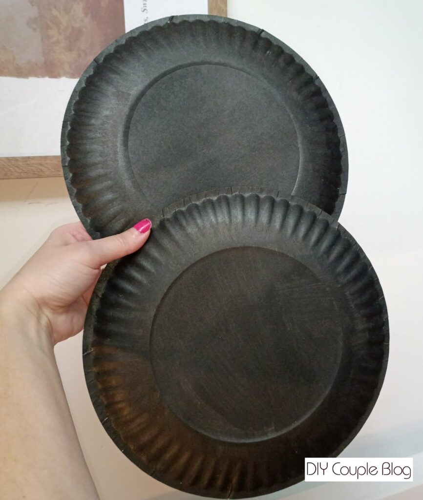 painting paper plates black to make game crafts